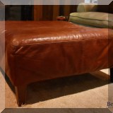 F16. Leather ottoman. 18” x 36” x 36” 